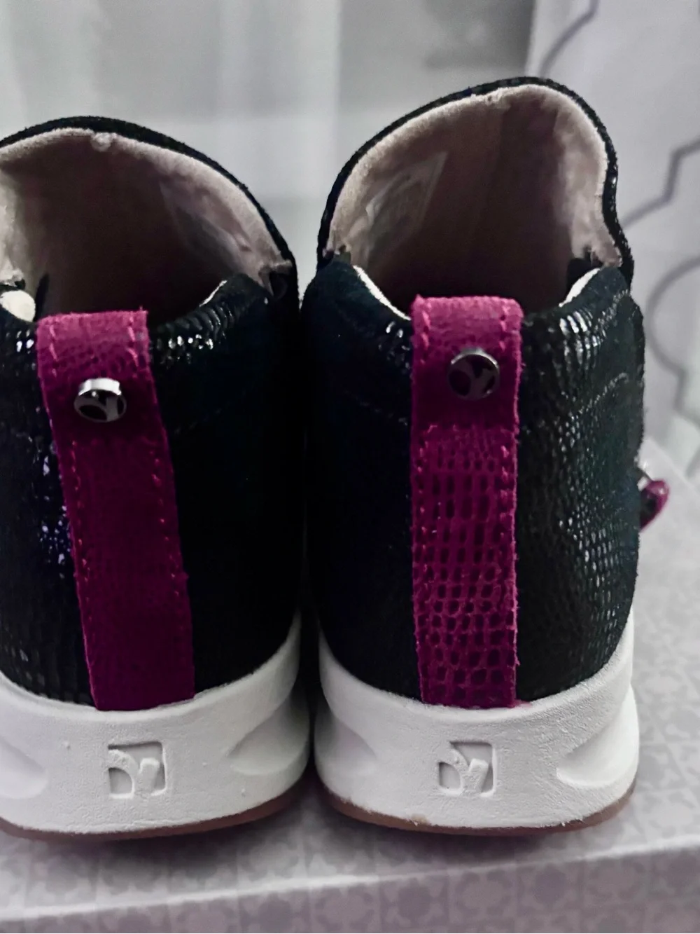 Reverse Black Slip-On Ankle Booties with Pink Pull Tabs